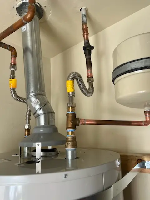 Water heater installation and plumbing repair in Crowfoot